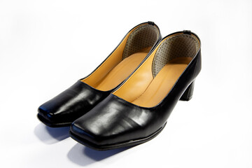 The shoes have black heels, high heels. Women's shoes with heels Shoes isolated on a white background Shoes for female students
