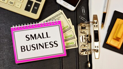 Small business is the inscription of text on the Notepad planning purposes. Strategy to achieve competitive advantage, search for new opportunities.
