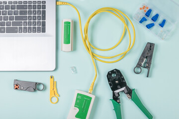 Checking the yellow ethernet cable with a lan tester.