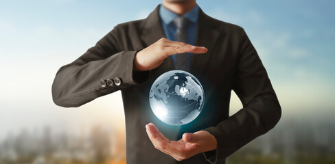 Globe ,earth in human hand, holding our planet glowing.  image provided by Nasa