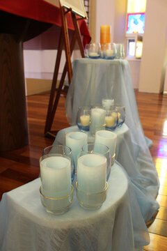 Candles arranged in front of altar for taize meditation in a Salesian Catholic chapel
