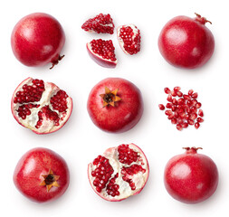 A set of pomegranate whole and sliced isolated on white background. Top view.