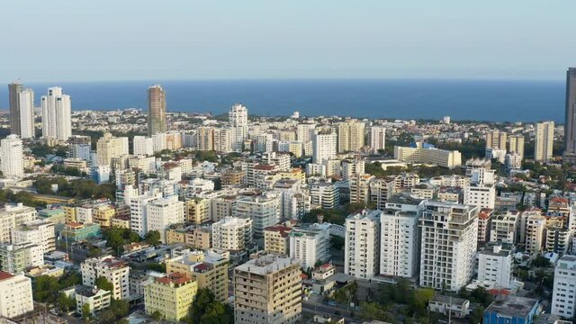 Aerial view of Santo Domingo in quarantine seeing the buildings and the Caribbean Sea in the background