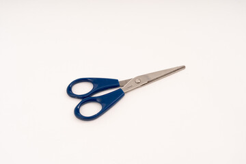 scissor with plastic handle on white background.