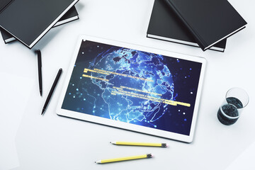 Modern digital tablet monitor with abstract creative coding sketch and world map, artificial intelligence and neural networks concept. Top view. 3D Rendering