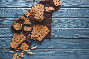Rye crispbreads on wooden table