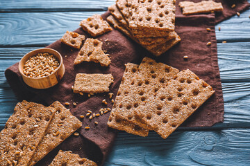 Rye crispbreads on wooden table