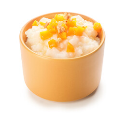 Bowl with boiled rice and pumpkin on white background