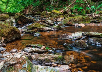 Falling Foss waterfall & May Beck, flowing stream through rocks