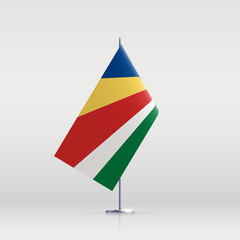 Seychelles flag state symbol isolated on background national banner. Greeting card National Independence Day of the Republic of Seychelles. Illustration banner with realistic state flag.