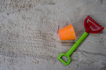 Children's toys on the sand beach