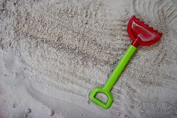 Children's toys on the sand beach