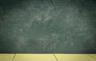 Wooden deck table on gray grunge concrete background