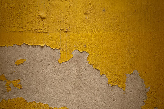 Old yellow grunge wall background