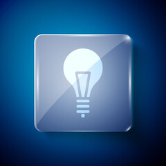 White Light bulb with concept of idea icon isolated on blue background. Energy and idea symbol. Inspiration concept. Square glass panels. Vector Illustration.