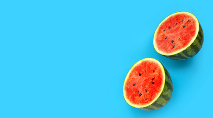 Fresh watermelon on blue background.