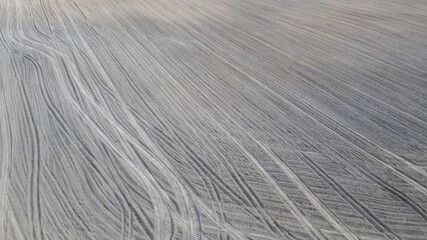 Plowed agricultural field, aerial view. Agricultural land. Background.