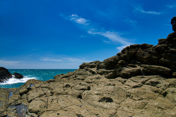 Fototapeta na wymiar rocks sea and sky