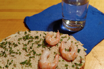 shrimp sandwich. boiled northern shrimp on white bread and a glass of Russian vodka