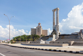 Havana, Cuba-October 07, 2016. View from the Malecon of The Maine Monument and famous, historic, Spanish eclectic style hotel "Nacional de Cuba" in background at the sea front of the Vedado district.