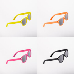 Color sunglasses isolated yellow, orange, pink, black
