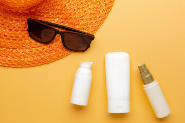 Set of sunblock moisturizer and spray to protect from sunlight on the beach. Summer vacation...
