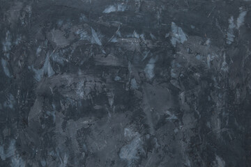 Dark concrete background, wall with texture, preparation for design. Copy space.