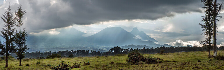 Three volcanoes seen from Rwanda in the border area with the Democratic Republic of Congo: mounts...