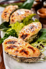 Baked Oyster with Cheese On The Plate