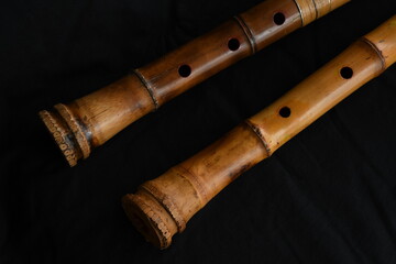 Shakuhachi flute, Shakuhachi is Japanese bamboo flute, on black background.