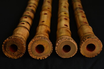 Shakuhachi flute, Shakuhachi is Japanese bamboo flute, on black background.