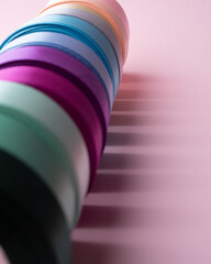 colored packing tape in rolls on colored background