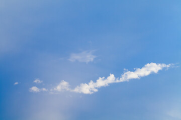 White clouds formation in blue sky,