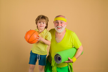 Family time together. Family sport. Portrait of a healthy grandfather and son working out. Family...