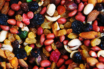 Assorted nuts and sweets. Trading in the grocery market. View from above. Close-up