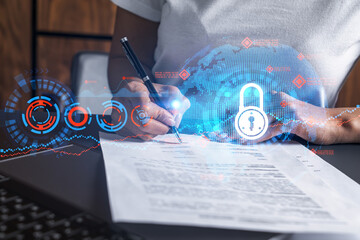 Woman signs agreement. Lock icon hologram. Double exposure. Internet Protection Concept