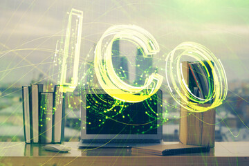 Multi exposure of blockchain theme hologram and table with computer background. Concept of bitcoin...