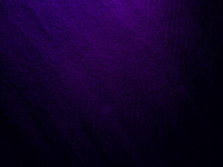 Black background with a violet tint.