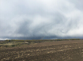 storm clouds over the field