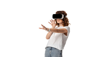 young woman in woman in virtual reality headset gesturing isolated on white © LIGHTFIELD STUDIOS