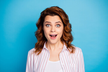 Fototapeta premium Closeup photo of pretty wavy foxy lady cheerful good mood open mouth listen crazy news staring wear white striped shirt isolated bright blue color background