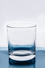 Whiskey clear glass. Empty transparent small glass.