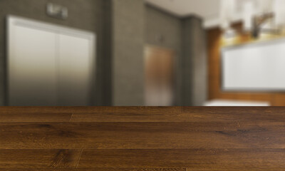 blurred interior on a wooden table background.View of the reception. Large secretary desk with monitors. White leather sofa for visitors. Lift hall.. 3D rendering. Mockup.   Empty paintings
