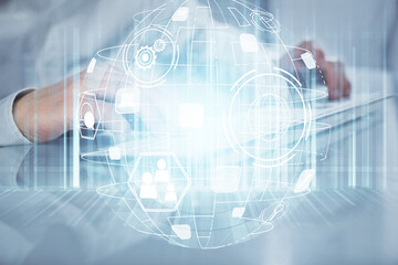 Social network theme hologram with businessman working on computer on background. Multi exposure.