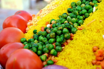 Indian road side snacks sev puri & bhel puri. Sev is gram flour vermicelli and bhel is puffed rice.