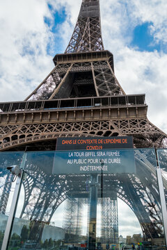 Paris, France - March 15 2020: Eiffel tower closed in order to stop the spread of Coronavirus epidemic - Paris, France. Information message in English.