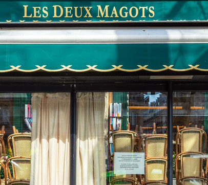 Paris, France - March 15 2020: Cafe les Deux Magots closed in order to stop the spread of Coronavirus epidemic.