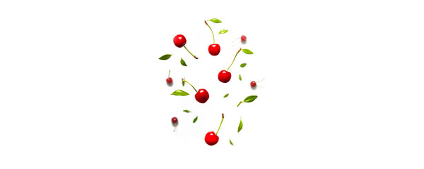 Organic cherry berry with green leaves levitating on white background. Berry summer background. Flat lay, top view, copy space