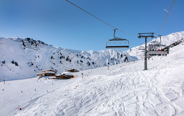 Fototapeta na wymiar Ski slopes and lifts in Mayrhofen, Zillertal valley, Austria.