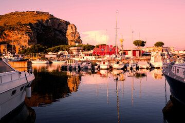 Terracina, sanctuary of Jupiter Anxur, a ot of boats and beautiful sunset.